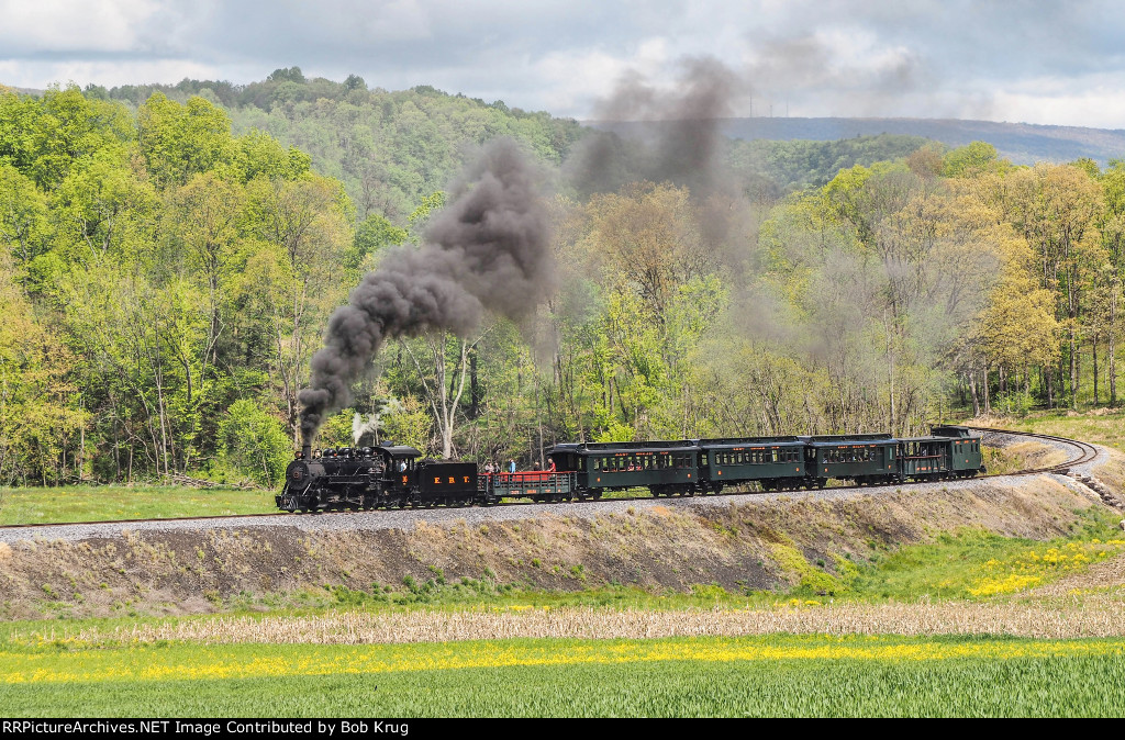 EBT 16 and excursion train southbound on the high fill